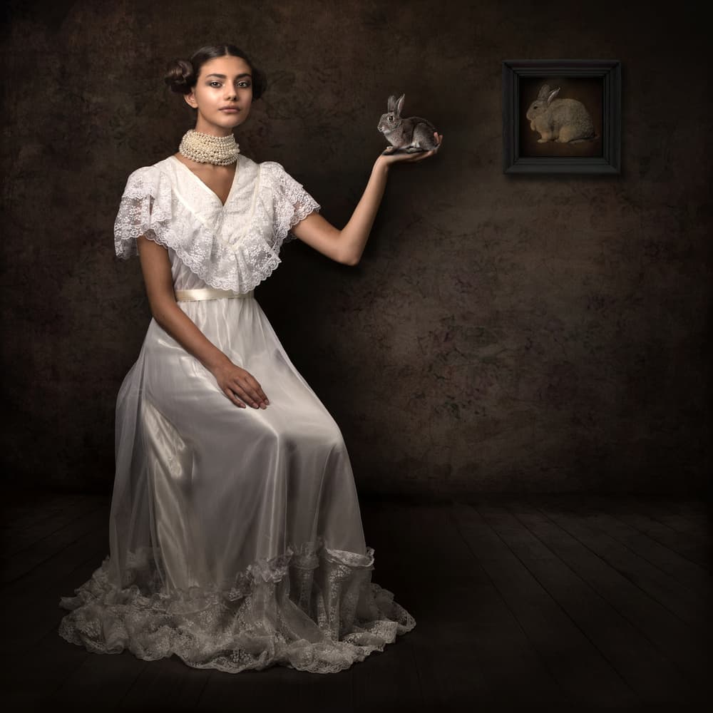 Elegant Woman with Rabbit by Joan Blease — canvas wall art
