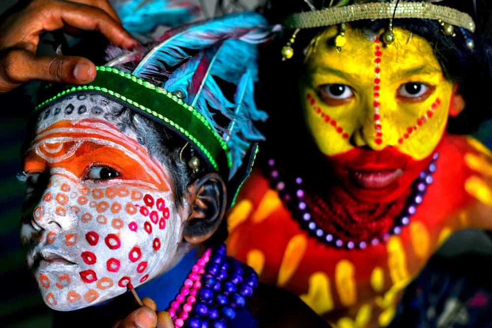 Vibrant Festival Faces by Avishek Das — canvas wall art