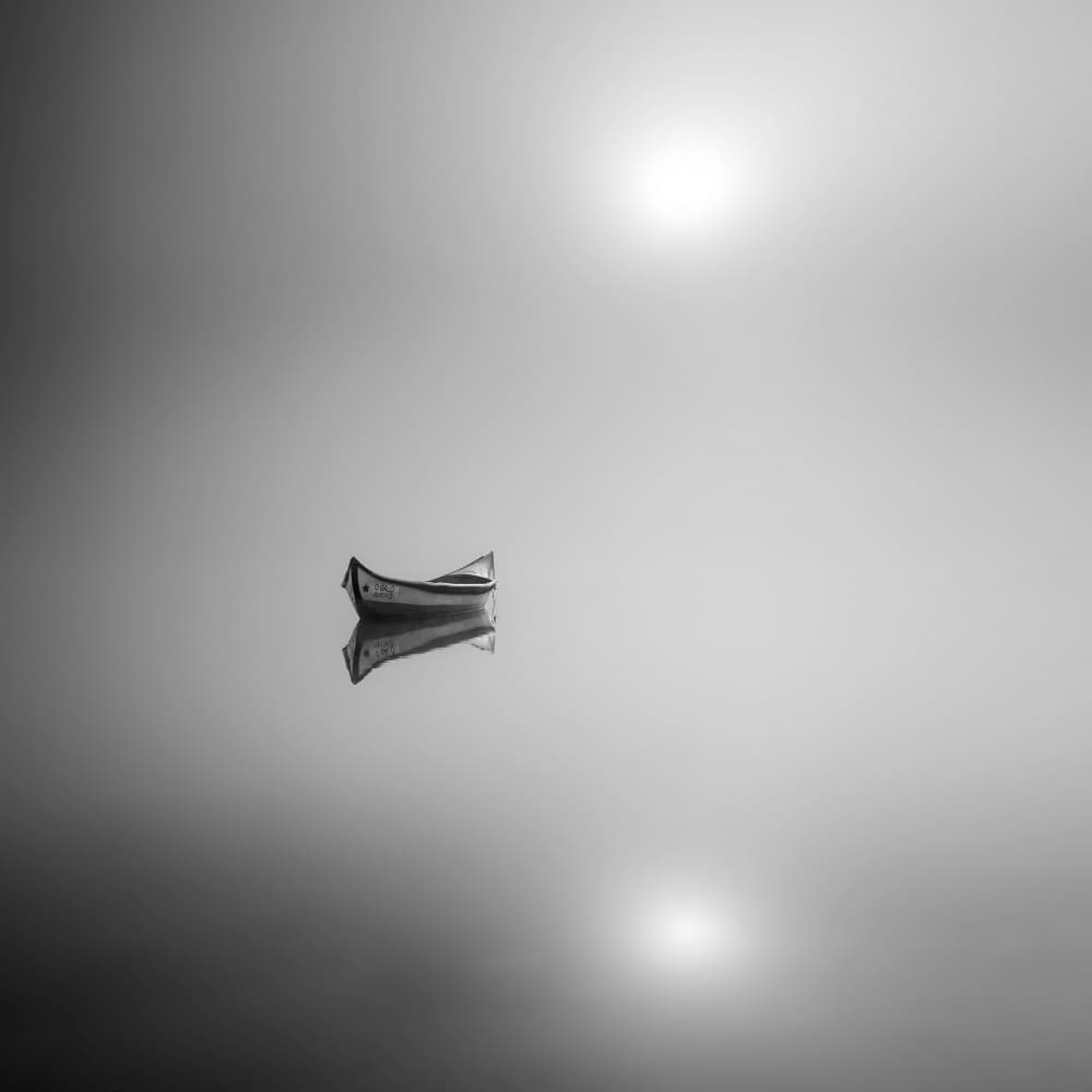 Serene Canoe Reflection by Marco Faria — canvas wall art