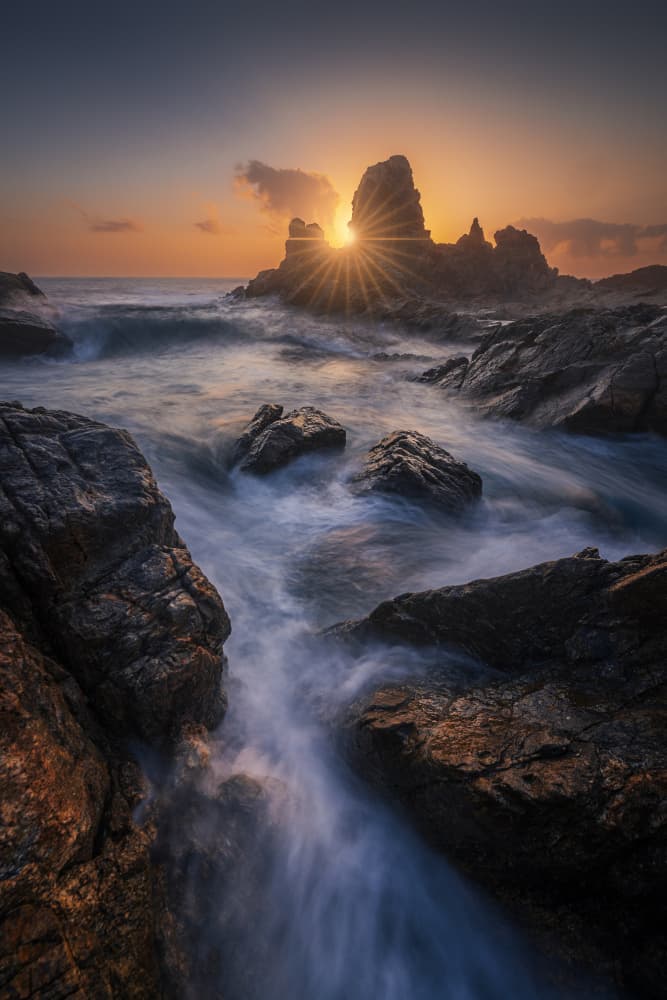 Radiant Coastal Sunset by Jorge Ruiz Dueso — canvas wall art
