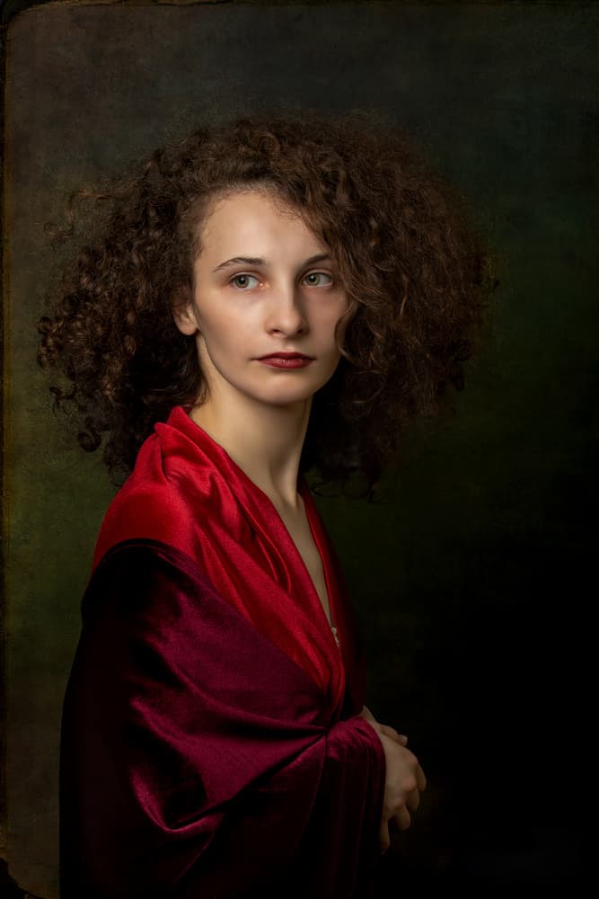 Pensive Woman in Red by Ionel Onofras — canvas wall art