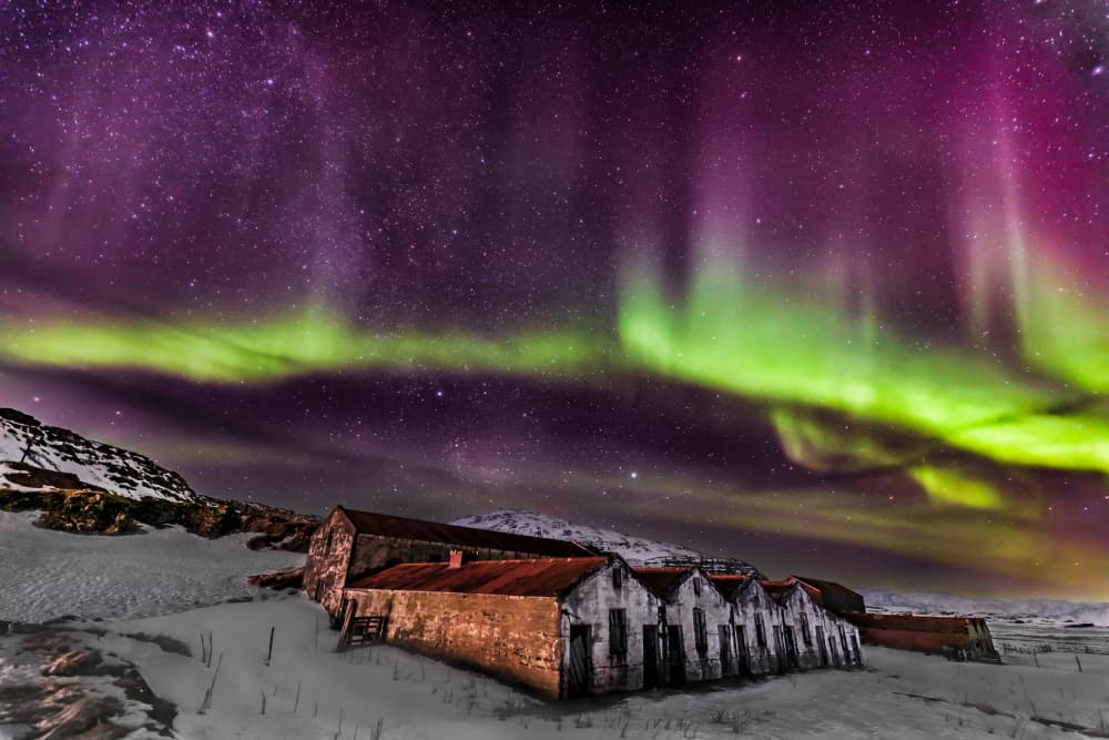 Aurora Over Rustic Huts by Mark Strom — canvas wall art