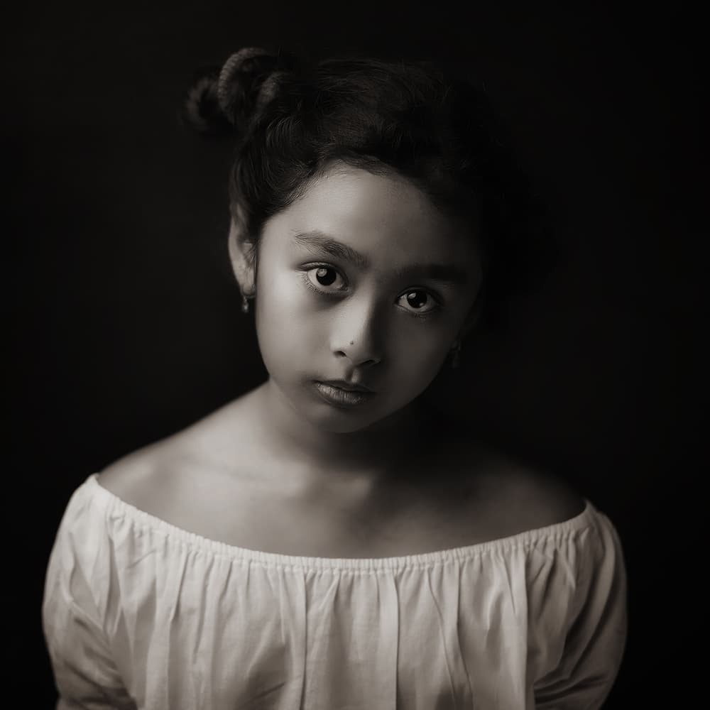Contemplative Child Portrait by Hari Sulistiawan — canvas wall art