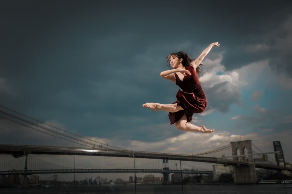Graceful City Leap by Jeff Wang — canvas wall art