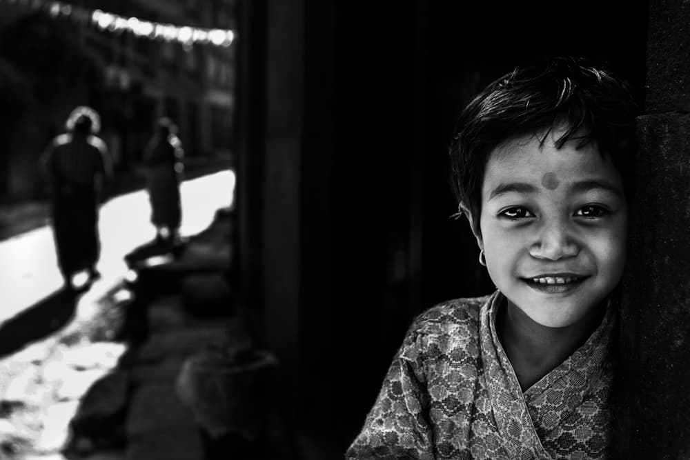 Smiling Young Boy by Nasser Al-Nasser — canvas wall art