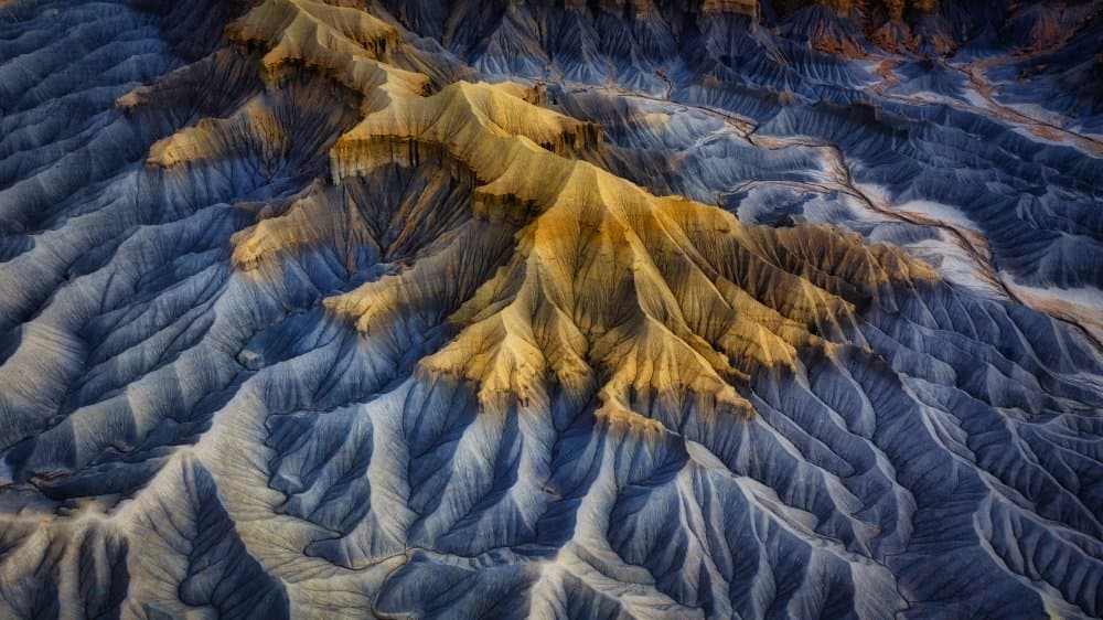 Golden Blue Badlands by Michael Zheng — canvas wall art