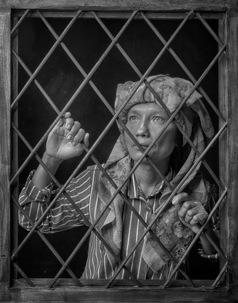 Woman's Pensive Gaze by Angela Muliani Hartojo — canvas wall art