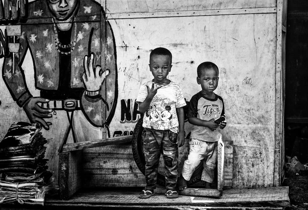 Two Boys Candid Gaze by Joxe Inazio Kuesta Garmendia — canvas wall art