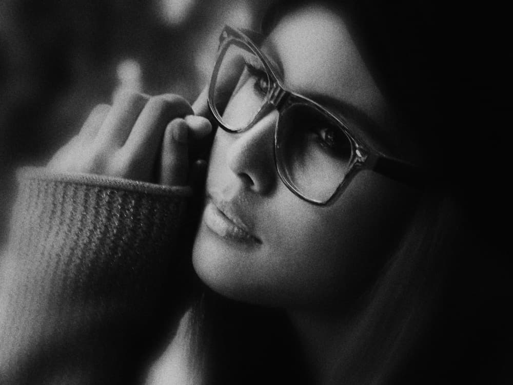 Pensive Woman With Glasses by Kahar Lagaa — canvas wall art