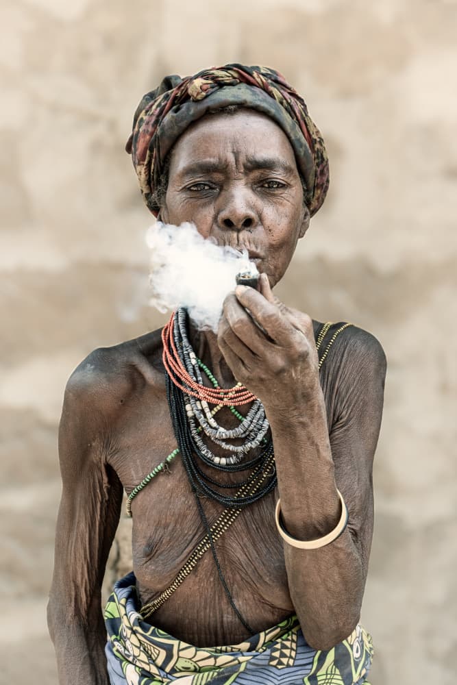 African Elder Smoking Pipe by Trevor Cole — canvas wall art