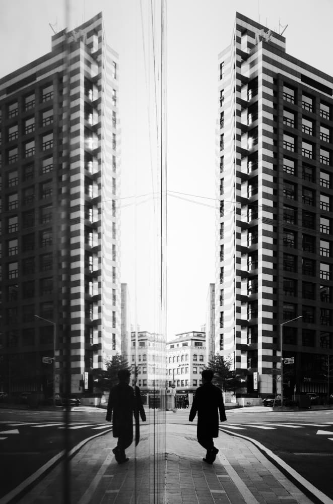Symmetrical City Reflections by Swen MUN — canvas wall art