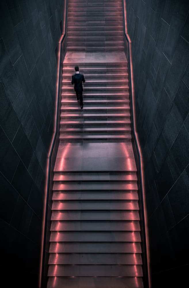 Journey Up Red Stairs by Marco Tagliarino — canvas wall art