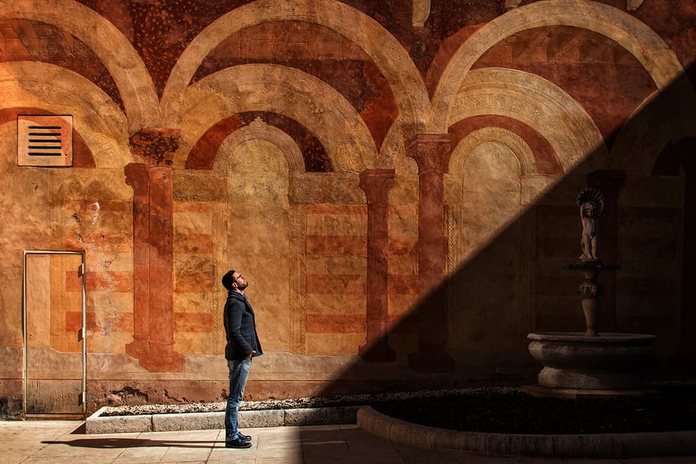Man Under Ancient Arches by Massimo Della Latta — canvas wall art
