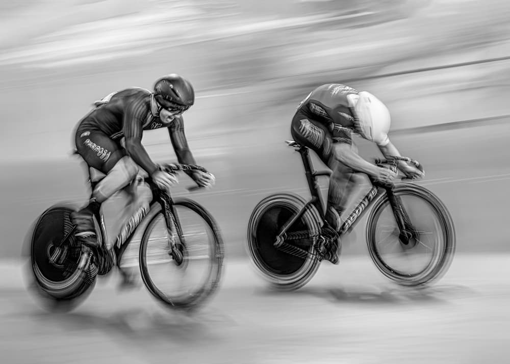 Speeding Cyclists Race by Louie Luo — canvas wall art