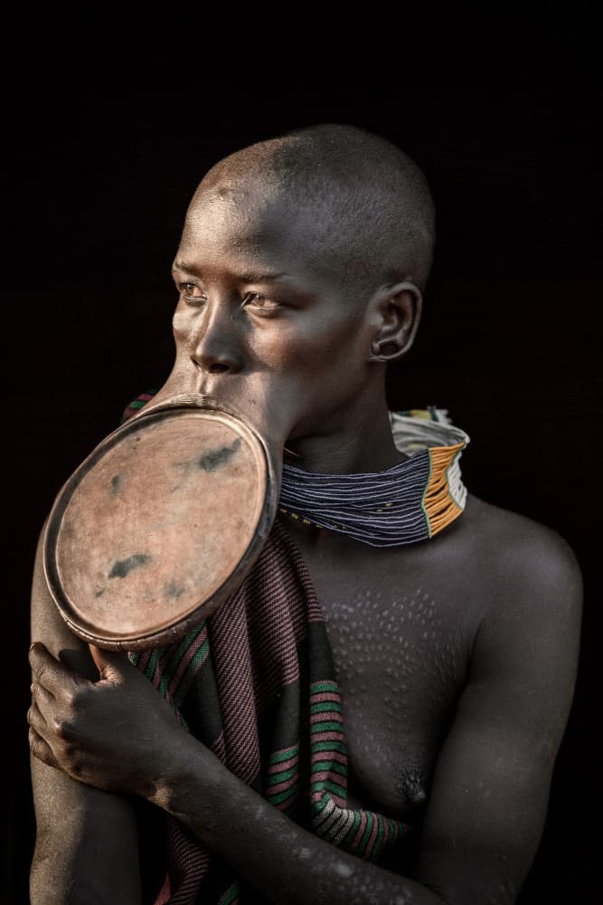 African Woman Adorned by Trevor Cole — canvas wall art