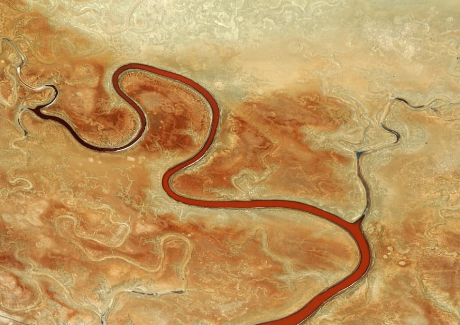 Winding Red River by Jure Kravanja — canvas wall art