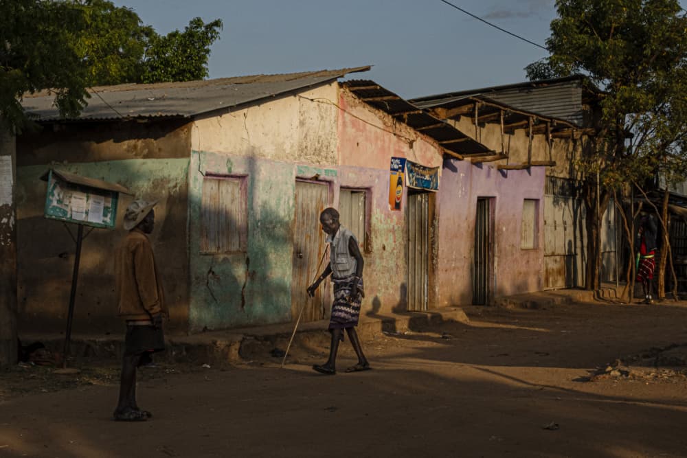 African Village Daily Life by Elena Molina — canvas wall art