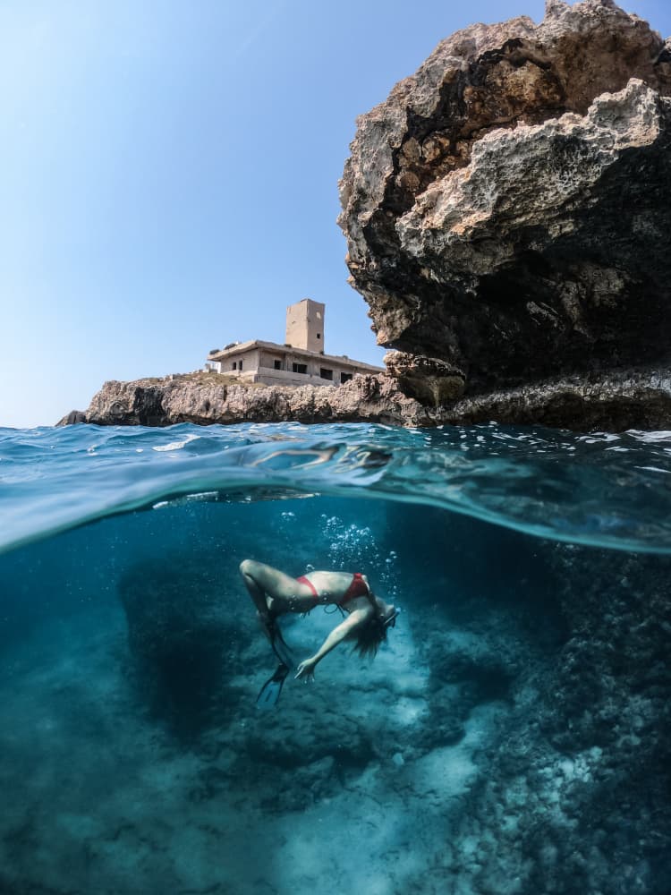 Coastal Swimmer Split View by Hilal safarjalani — canvas wall art