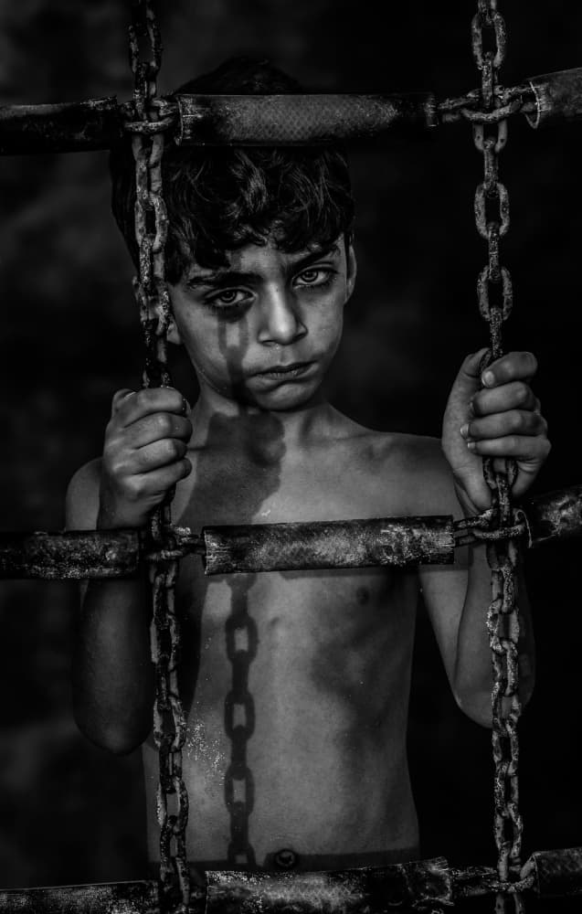 Chained Youth Portrait by Saeed Dhahi — canvas wall art