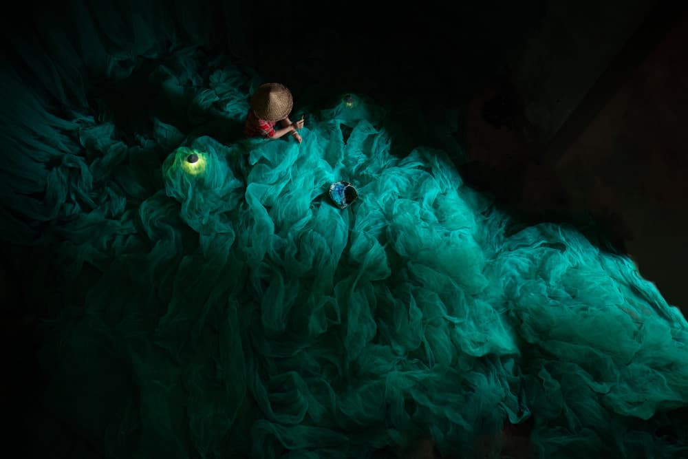 Child on Glowing Nets by Songlin Xu — canvas wall art