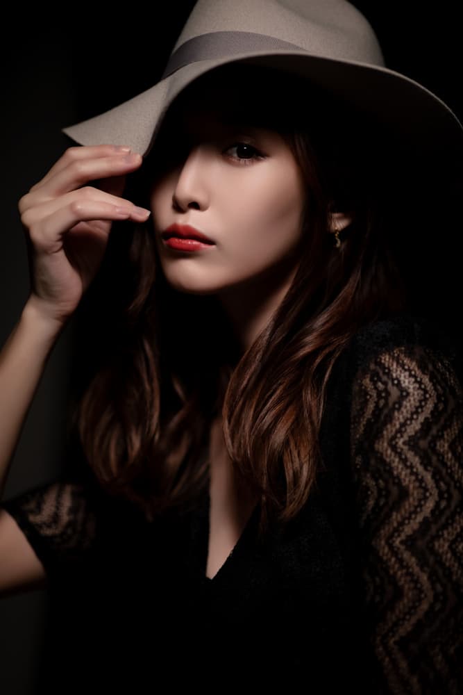 Mysterious Woman in Hat by boss — canvas wall art