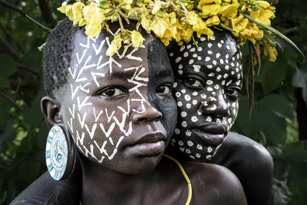 Tribal Faces Yellow Flowers by Elena Molina — canvas wall art