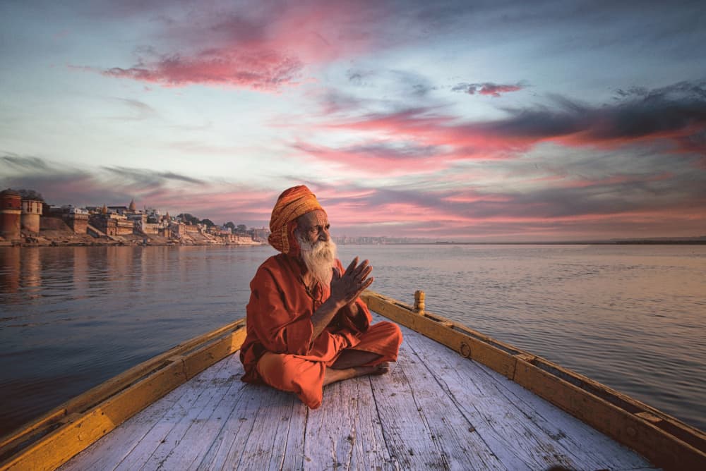 Sadhu on Ganges River by Vivek Kalla — canvas wall art
