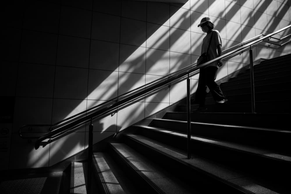 Solitary Figure Descending by Satoshi Hata — canvas wall art
