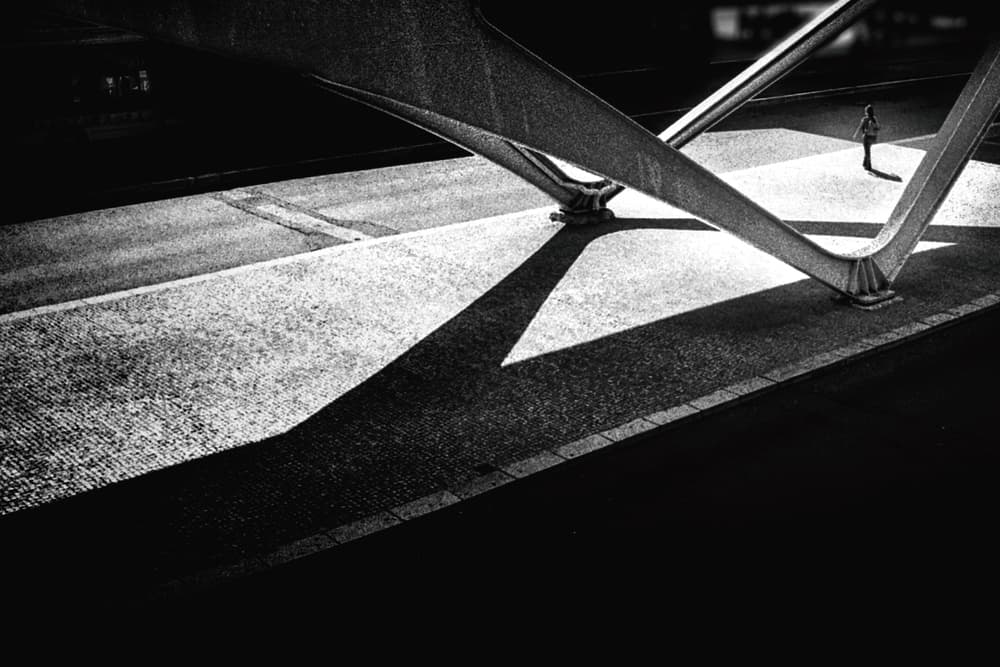 Solitary Figure Urban Shadows by Rui Correia — canvas wall art