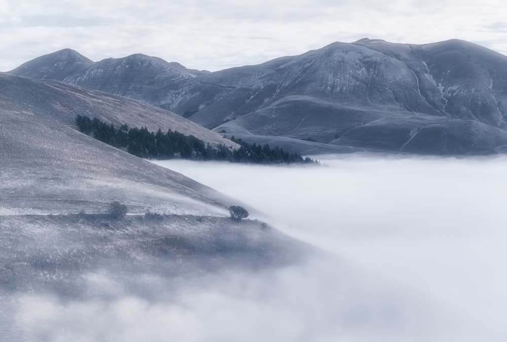 Misty Mountain Valley by Fabrizio Massetti — canvas wall art
