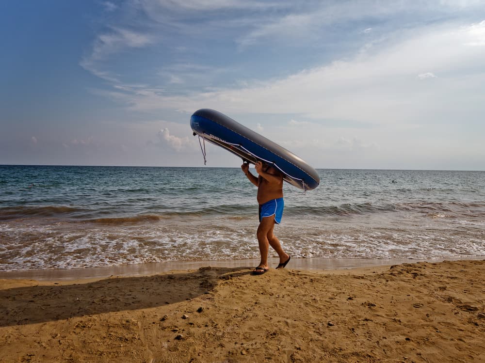 Beach Day Carry by Lorenzo Grifantini — canvas wall art