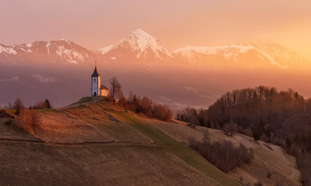 Golden Alpine Church by Ales Krivec — canvas wall art