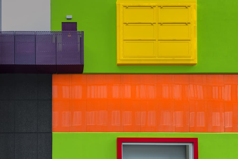 Vibrant Geometric Facade by Theo Luycx — canvas wall art