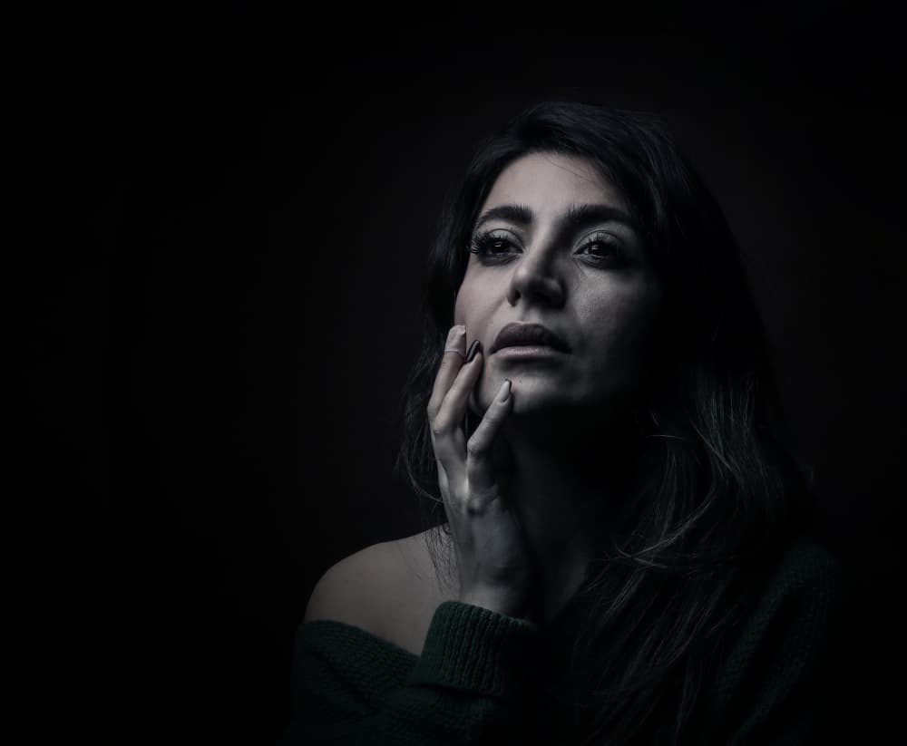 Pensive Woman's Portrait by Moein Hasheminasab — canvas wall art