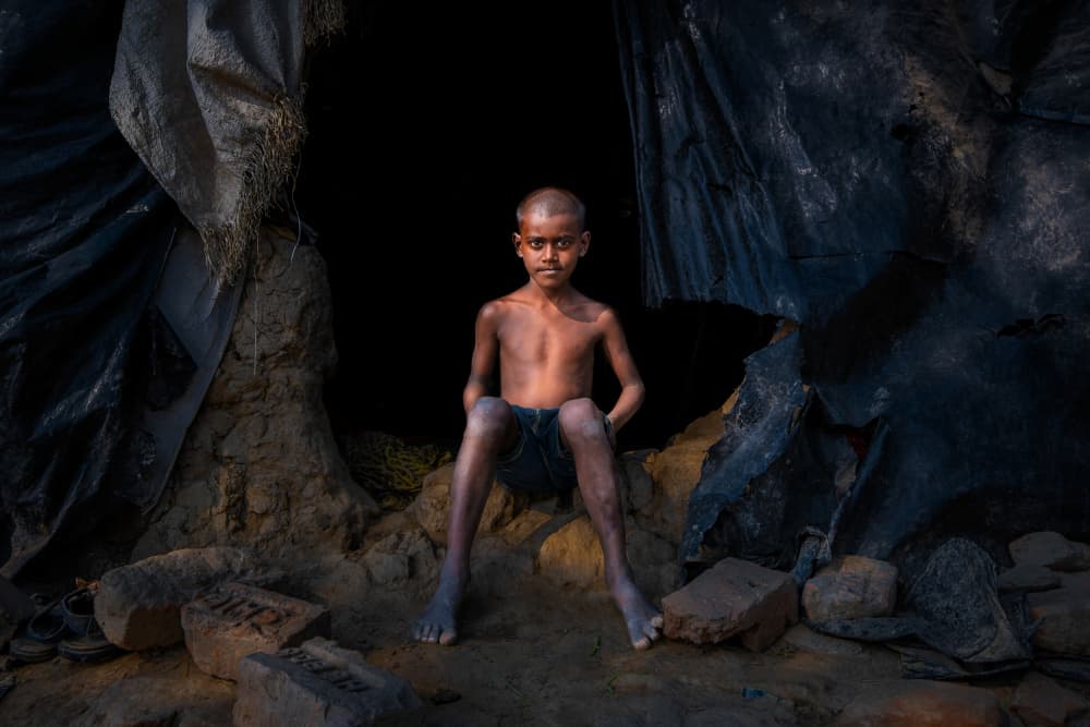 Boy In Dark Shelter by Kuntal Biswas — canvas wall art