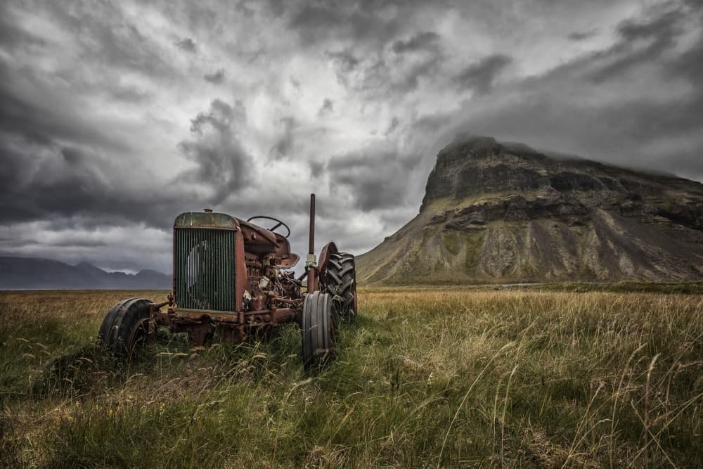 Old Tractor Mountain View by Bragi Ingibergsson - BRIN — canvas wall art