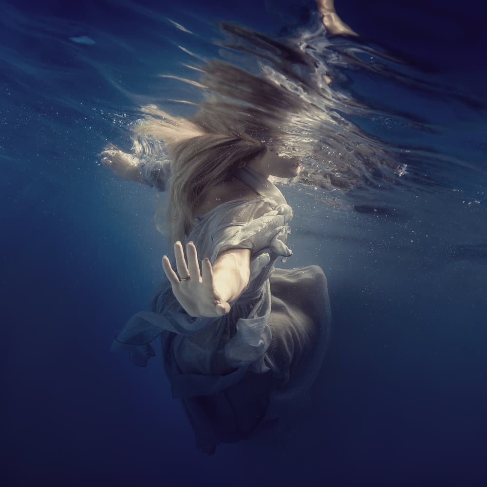 Woman Floating Underwater by Dmitry Frizel — canvas wall art