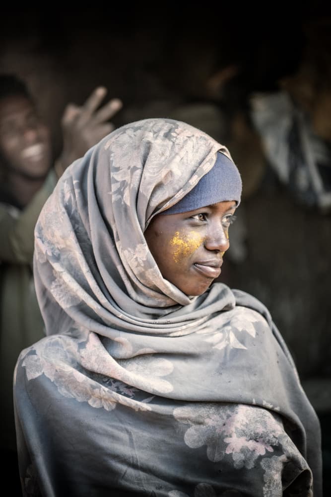 Young Woman Golden Gaze by Trevor Cole — canvas wall art