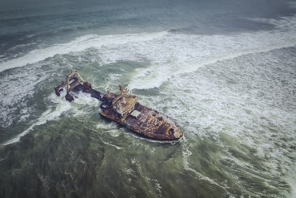 Shipwreck In Rough Sea by Michael Zheng — canvas wall art