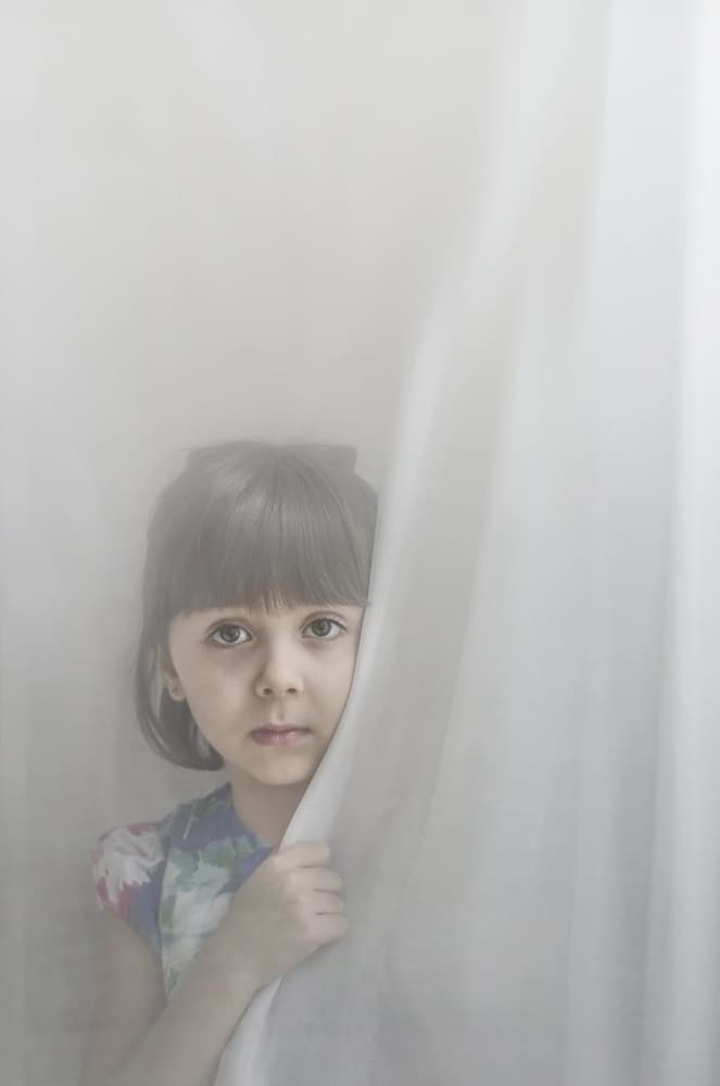 Curious Child Behind Curtain by Desislava Ignatova — canvas wall art