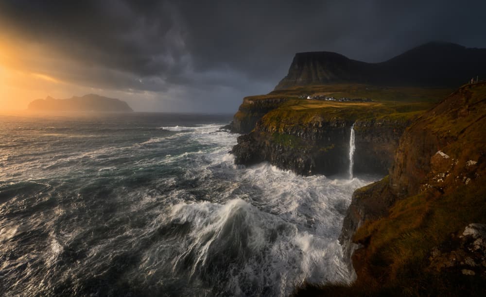 Stormy Cliffside Waterfall by Tomasz Rojek — canvas wall art