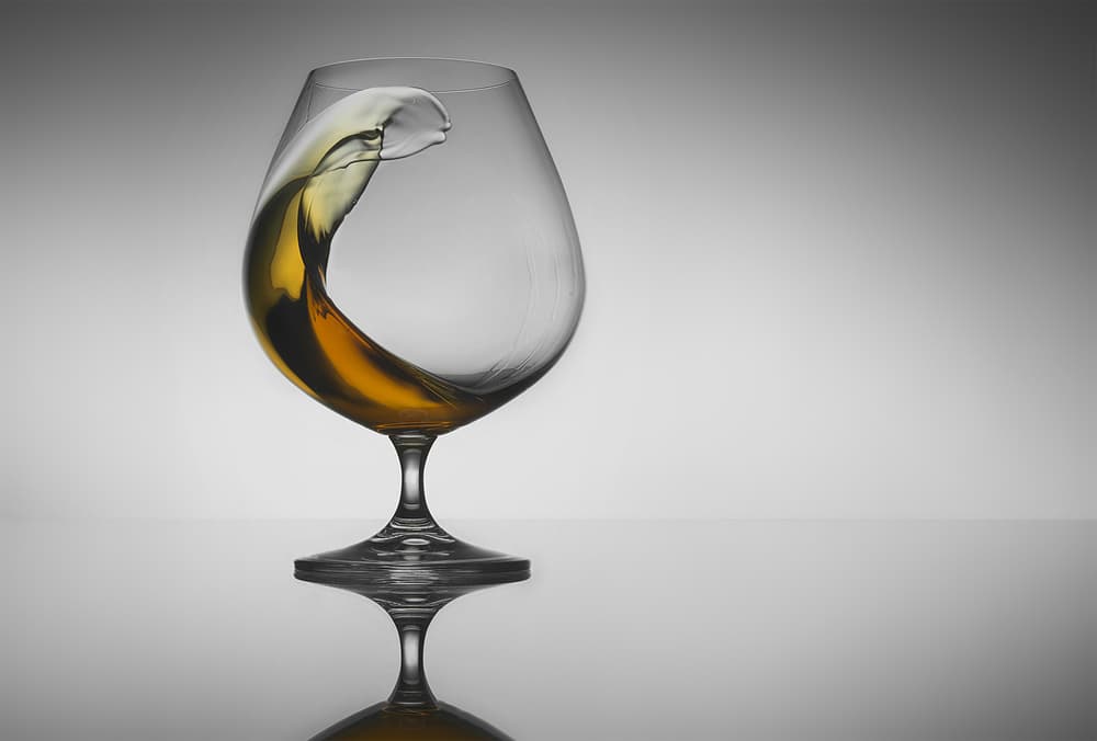 Elegant Cognac Splash by Jackson Carvalho — canvas wall art