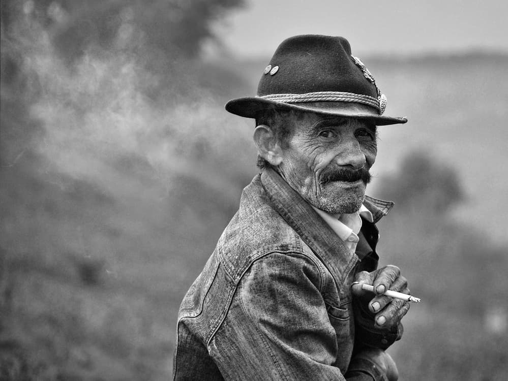 Old Man Smoking by Nicoleta Gabor — canvas wall art
