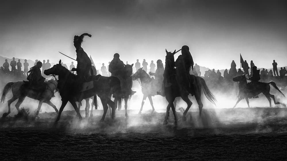 Silhouetted Desert Riders by Babak Mehrafshar — canvas wall art