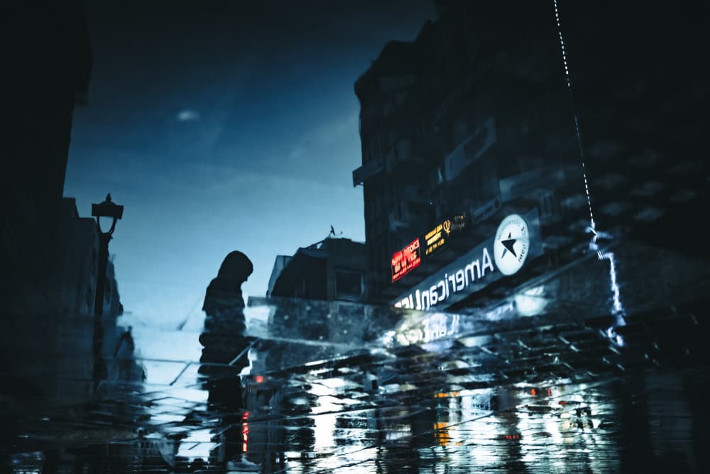 Lone Figure Rainy Night by Ali Ayer — canvas wall art