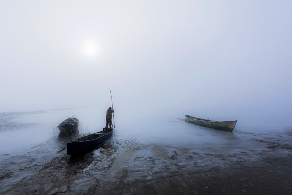 Man In Foggy Waters by Ali Can — canvas wall art