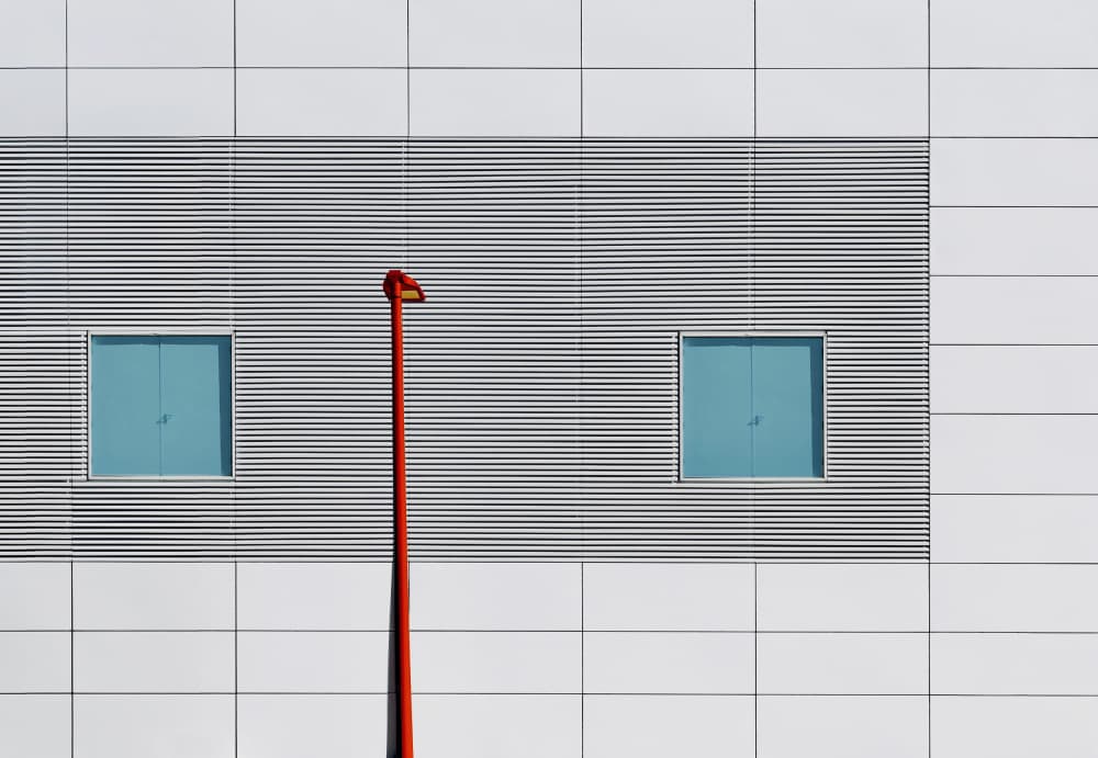 Red Post Blue Windows by Arnon Orbach — canvas wall art
