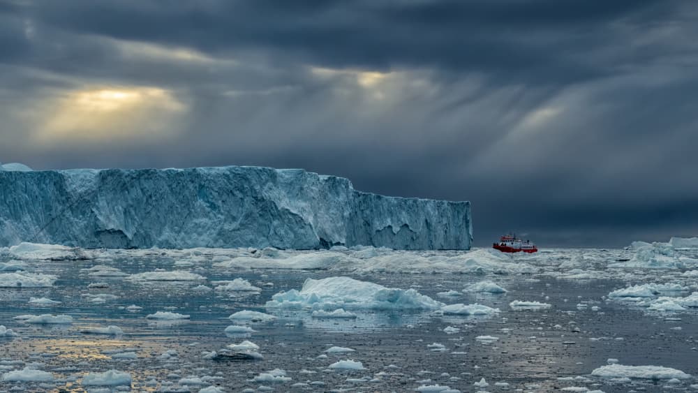 Arctic Glacier Sun Rays by Haim Rosenfeld — canvas wall art