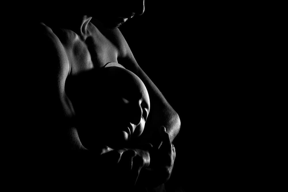 Dramatic Figure Holding Head by Paulo Medeiros — canvas wall art