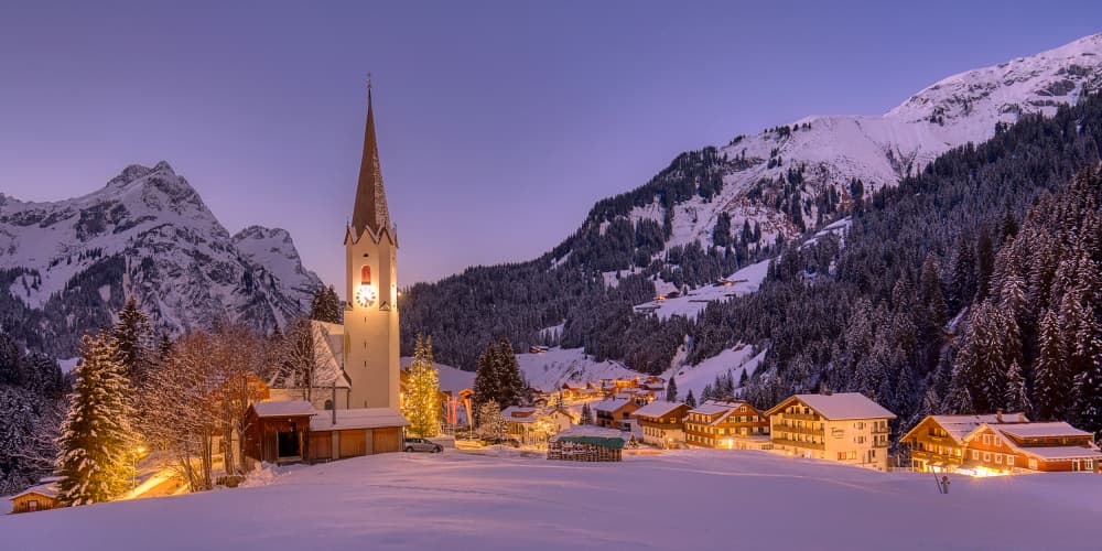 Cozy Winter Village Evening by Judith Kuhn — canvas wall art